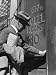 Depression Era Man Opening Door To '30 Cent a Night' Hotel Photographic Poster Print by H. Armstrong Roberts, 12x16
