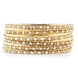 Set of 11 Gold and White Bangles