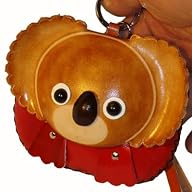 Handmade Leather Wristlet Purse, a Brown Girl Koala Bear Face on the Cover, Zipper Closure.