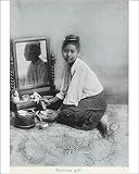 Photographic Prints of A Burmese girl preparing her make-up from Mary Evans