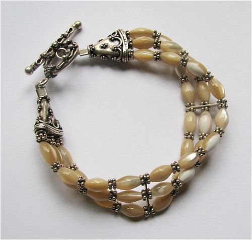 Click here to buy Triple Strand Mother of Pearl Bracelet.