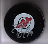 TRAVIS ZAJAC AUTOGRAPHED PUCK NEW JERSEY DEVILS W/PROOF