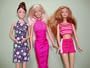 A Set of 6 Outfits and 3 Pairs of Shoes Made to Fit the Barbie Doll