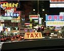 Photographic Print of Taxi sign and neon lights at night on Nathan 
Road, Kowloon, Hong Kong, China,... from Robert Harding