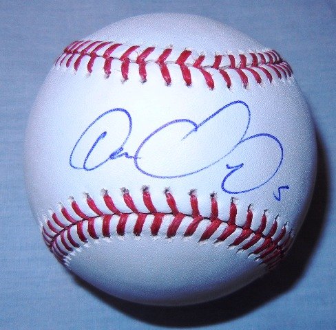 Carlos Gonzalez Autographed Official Major League Baseball W/PROOF, Picture of Carlos Signing For Us, Colorado Rockies, Gold Glove Award, Oakland Athletics