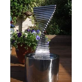 Stainless steel twist mains garden water feature