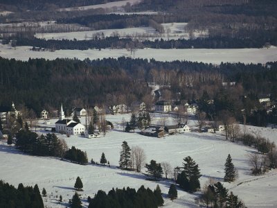 Aerial of a Steepled Church and White Clapboard Homes Near Craftsbury