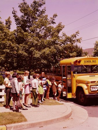 Students in Line, Waiting To Board School Bus