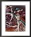 A Cyan Bike against a Bright Red Background National Geographic Collection Framed Art Poster Print by Stacy Gold, 18x22