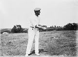 1906 photo Alex Smith Alex Smith, winner of championship in pro golf match, holding golf club.