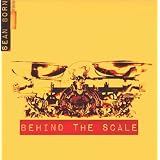 BEHIND THE SCALE