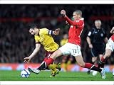 Photographic Prints of Robin van Persie (Arsenal) Chris Smalling (Man United). Manchester United 2 from Arsenal FC Prints