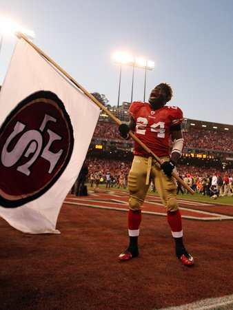 San Francisco 49ers and New Orleans Saints: Anthony Davis Photographic Poster Print by Ben Liebenberg, 9x12