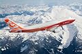 747-8IC Sunrise Livery Over Mountain Matted Print