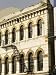 Fire Escape Ladder Running Down Outside a Downtown Dunedin Building Photographic Poster Print by Bil