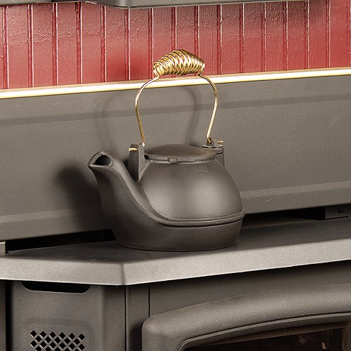 51nXa94oXNL The Condar Half Kettle Steamer   MATTE BLACK with BRASS HANDLE   is a humidifier especially designed for narrow ledges of fireplace inserts and woodstoves. Only 4 inches wide, yet it looks like a whole kettle when in place, and holds over 2 quarts of water! A similar capacity to most full size kettles. This unique, patented design features a spout cleverly sculpted to direct steam into the room, away from the flat side of the kettle. The lid conveniently swivels open to the front, so it wont fall off while filling with water. The Half Kettle is crafted of quality hand cast Aluminum, unlike cheaper cast iron kettles, which rust and eventually crack, staining surfaces. Lightweight and a joy to use, the Half Kettle also makes a beautiful decorative accent for the home. Made in the USA by American artisans, the Half Kettle is created using the time honored traditions of Old World craftsmanship.