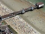 Beachgoers Crowd Around the Pier at Old Orchard Beach, Maine Places Photographic Poster Print, 64x48