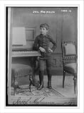 Newswire Photo (S): Josef Hofmann standing next to piano, J.C. Schaarwachter, Berlin / J.C. Schaarwachter