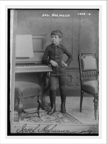 Newswire Photo (S): Josef Hofmann standing next to piano, J.C. Schaarwachter, Berlin / J.C. Schaarwachter