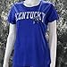 University of Kentucky Ladies Cut Distressed Arch on a Royal Heather Shirt