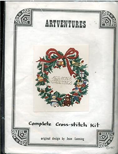 Artventures Cross Stitch Kit Dated 1987 Sesigned by Jean Lanning Christmas Wreath Featuring various holiday symbols including candy cane, teddy bear, toy soldier, trumpet, train and othes.