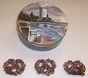 Scott's Cakes 1 lb. Dark Chocolate Covered Pretzel with Chocolate Chips & Peanut Butter Chips in a Lighthouse Tin