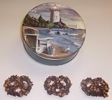 Scott's Cakes 1 lb. Dark Chocolate Covered Pretzel with Chocolate Chips & Peanut Butter Chips in a Lighthouse Tin