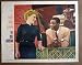 Search : CV06 Blue Gardenia NAT KING COLE/ANNE BAXTER Lobby Card.  Here's a terrific PORTRAIT lobby card from the original release of THE BLUE GARDENIA featuring a great image of ANNE BAXTER and NAT KING COLE.    Lobby card is in EXCELLENT+ condition. No pinholes, no stains, no tears.       A lobby card is an 11 x 14 inch placard advertising a movie. They were displayed in the theatre lobby to entice moviegoers to go to the box office and buy a ticket.