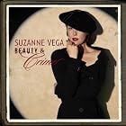 Click here to buy Beauty and Crime by Suzanne Vega .