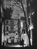 People Looking at the Exterior View of the Grand Guignol Theater Photographic Poster Print by Hans Wild, 12x16