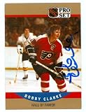 Bobby Clarke Autographed/Hand Signed Hockey Card (Philadelphia Flyers) 1990 Pro Set #657