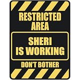  RESTRICTED AREA SHERI IS WORKING  PARKING SIGN