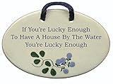 If You're Lucky Enough To Have A House By The Water, You're Lucky Enough. Mountain Meadows Pottery ceramic plaques and wall art signs with sayings and quotes about beach, lake, and vacation homes. Made by Mountain Meadows Pottery in the USA.