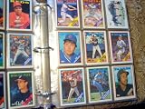 2005 Topps Baseball Card Set in PAGES and BINDER. Includes 5 Bonus First Year New York Yankees Cards with Robinson Cano!