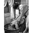 Coal Miner Mabrey Evans Getting Back Scrubbed by His Wife Photographic Poster Print by Alfred Eisenstaedt, 24x32