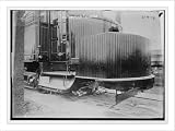 Newswire Photo (S): Testing car fender on end of railroad car