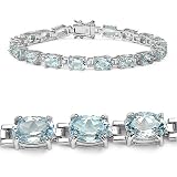 Classic 18.00 Carat Genuine Blue Topaz Oval Sterling Silver Eternity Bracelet
