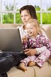 Clipping Path! Mother with Daughter on the Sofa - 24