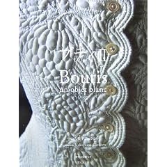�u�e�B�q2�rBoutis�\un objet blanc