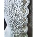 �u�e�B�q2�rBoutis�\un objet blanc