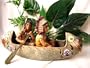 Two Indians Rowing a Canoe Statue