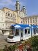 Tram and Old Cathedral, Hauptplatz, Linz, Austria Photographic Poster Print by Charles Bowman, 12x16