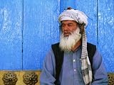 Man Praying in Front of Blue Mosque, Mazar-E Sharif, Balkh, Afghanistan Art Photographic Poster Print by Stephane Victor, 12x9