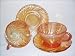 Carnival Glass Cup and Saucer in Marigold Tone