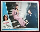 AE01 AMAZING MRS HOLLIDAY Deanna Durbin orig `43 LC A terrific lobby card from AMAZING MRS HOLLIDAY with Deanna Durbin. Lobby card is in excellent condition. A lobby card is an 11 x 14 inch placard advertising a movie.