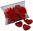 Valentines 10 Heart Shaped Chocolates wrapped up in red foil and tied with a red satin bow, making a great valentines gift