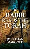 A rabbi reads the Torah