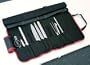 Paderno World Cuisine 9 Piece Cutlery Roll bag with one each Chef's Knife, Slicing Knife, Ham Knife, Boning Knife, Paring Knife, Bread Knive, Chef's Fork, Sharpening Steel and Kitchen Scissors