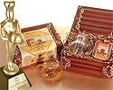 Numi Organic Tea Flowering Gift Set in Handcrafted Mahogany Bamboo Chest: Glass Teapot & 6 Flowering Tea Blossoms