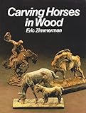 Carving horses in wood